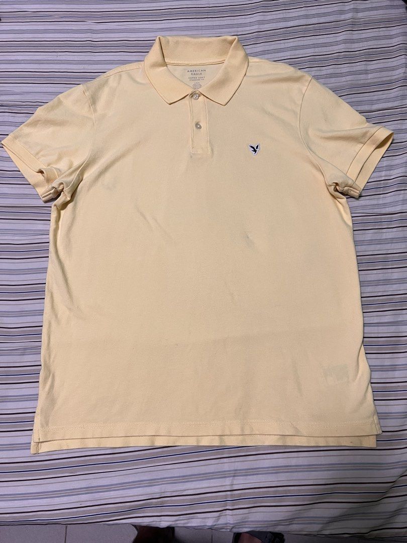 American Eagle Yellow Polo Shirt (Category: Tshirts & Polo Shirts ) located in Tanza. Submitted by shunsuiiii (Listing ID 1470332746, Image 1). Description: - Standard fit L (22x29) - MOP: Maribank/Gotyme.
