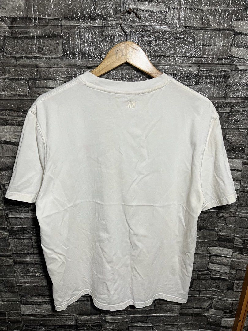 Ami Paris De Cour Embroidered Logo Shirt (Category: Luxury Apparel) located in Manila. Submitted by flex_curation (Listing ID 1470221640, Image 3). Description: 21x25 IN VERY GOOD CONDITION BACOOR CAVITE LOC.
