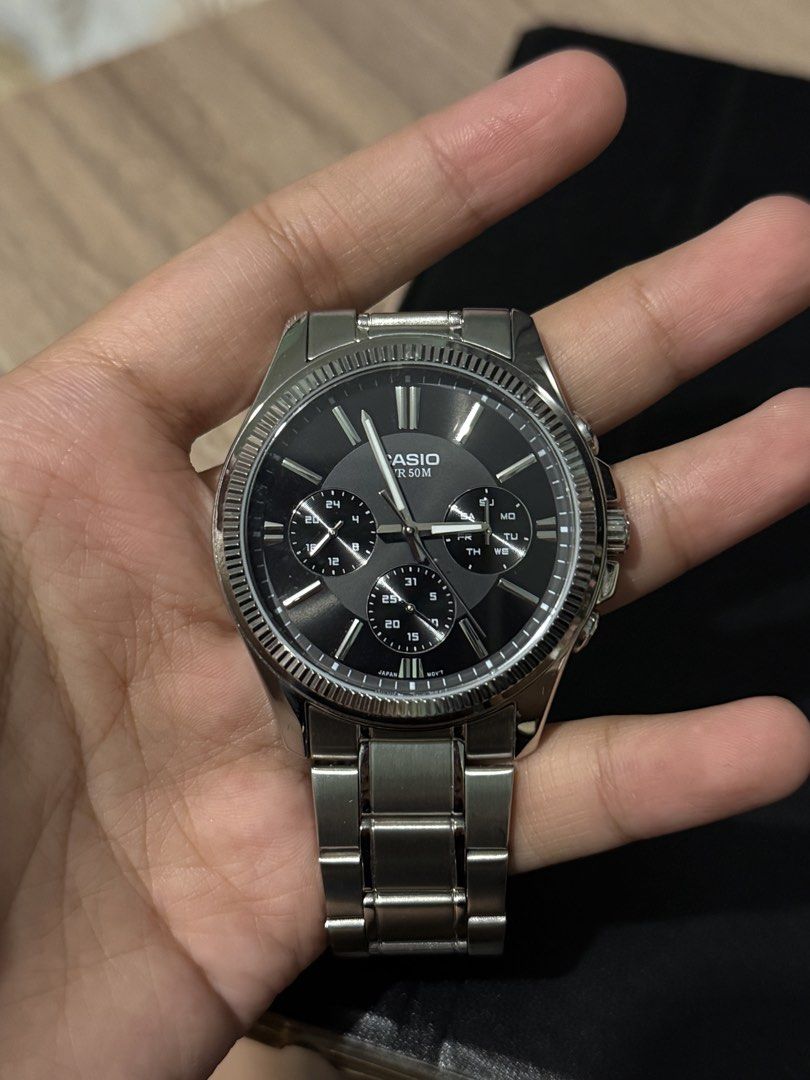 Analog Watch MTP-1375D-1A (Category: Men's Watches) located in Manila. Submitted by nyamiii (Listing ID 1470213537, Image 2). Description: Selling a Casio MTP-1375 stainless steel watch with a sleek black multi-dial face (date, day, 24-hour). Features a stylish fluted bezel and comfortable metal bracelet. Water-resistant up to 5 bar with reliable Japan movement..