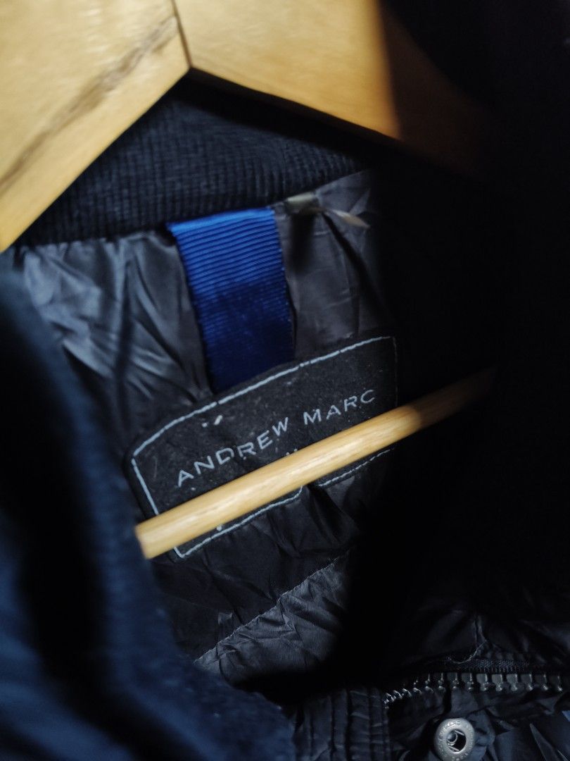 Andrew Marc Black Quilted Winter Puffer Jacket (Category: Coats, Jackets and Outerwear) located in Makati City. Submitted by theroadthrift (Listing ID 1470149285, Image 2). Description: - Brand: Andrew Marc - Color: Classic Black - Insulation: Thick quilted padding for maximum warmth - Closure: Full zip with snap button storm flap overlay - Design: High collar for wind protection and branded metal hardware - Cuffs: Ribbed inner cuffs to trap heat