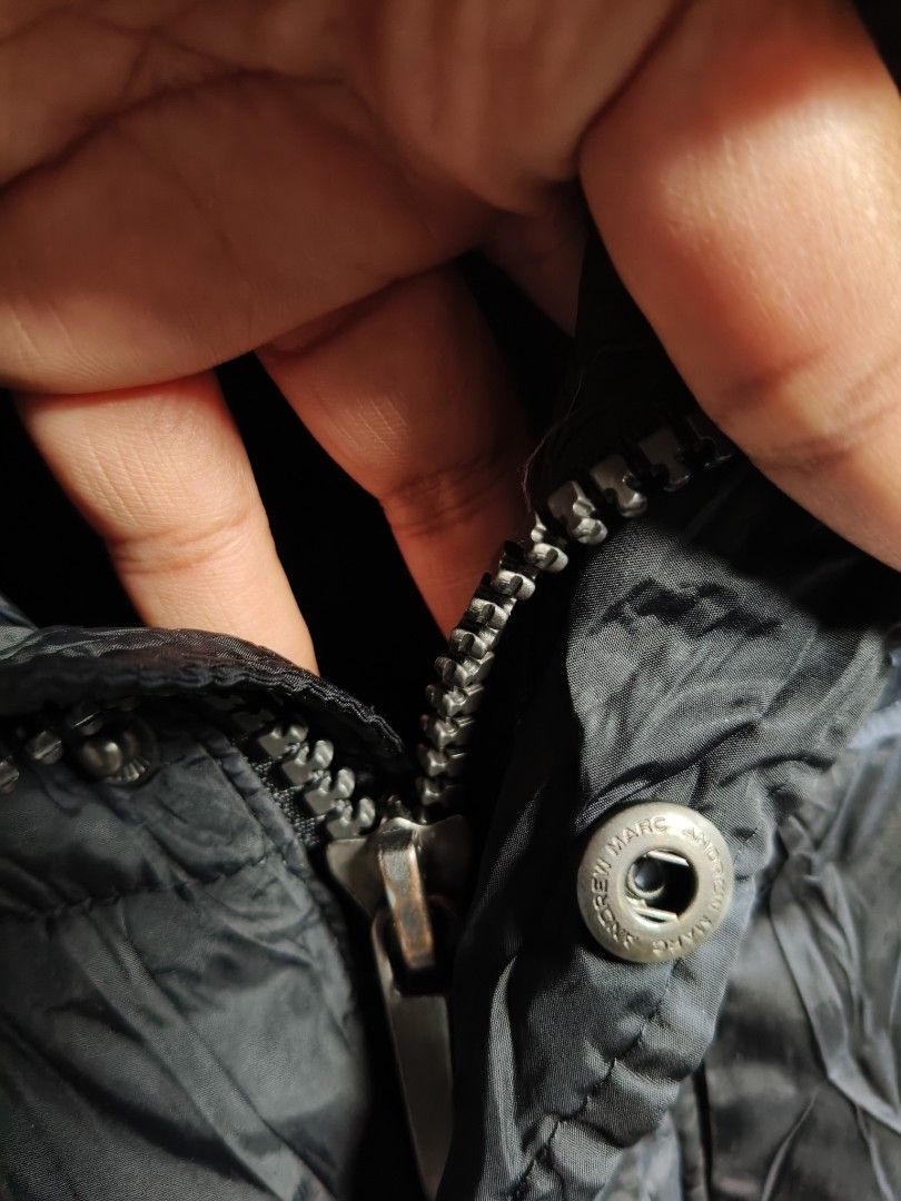 Andrew Marc Black Quilted Winter Puffer Jacket (Category: Coats, Jackets and Outerwear) located in Makati City. Submitted by theroadthrift (Listing ID 1470149285, Image 3). Description: - Brand: Andrew Marc - Color: Classic Black - Insulation: Thick quilted padding for maximum warmth - Closure: Full zip with snap button storm flap overlay - Design: High collar for wind protection and branded metal hardware - Cuffs: Ribbed inner cuffs to trap heat