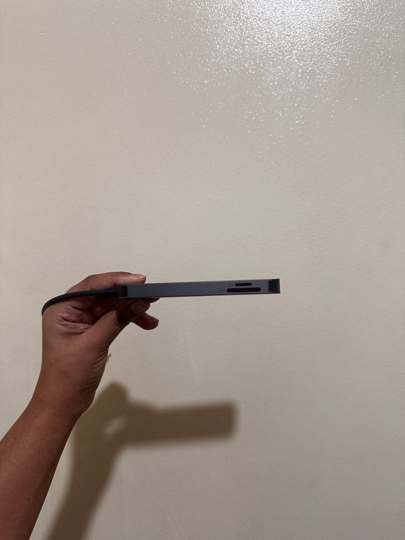 Anker USB-C Hub Multi-Port Adapter Grey Macbook Connector (Category: Cables & Adaptors) located in Cainta. Submitted by bangbangb (Listing ID 1470191890, Image 3). Description: - Brand: Anker USB-C Hub - Color: Dark grey with a compact aluminum body - 7 Ports: 2 USB, 1 HDMI, 1 SD card slot, 1 Power Delivery (PD), 1 Type C, 1 TF - Connection: Attached cable with USB-C connector - Condition: Clean unit, works great, like new, no box - Bought for Ph