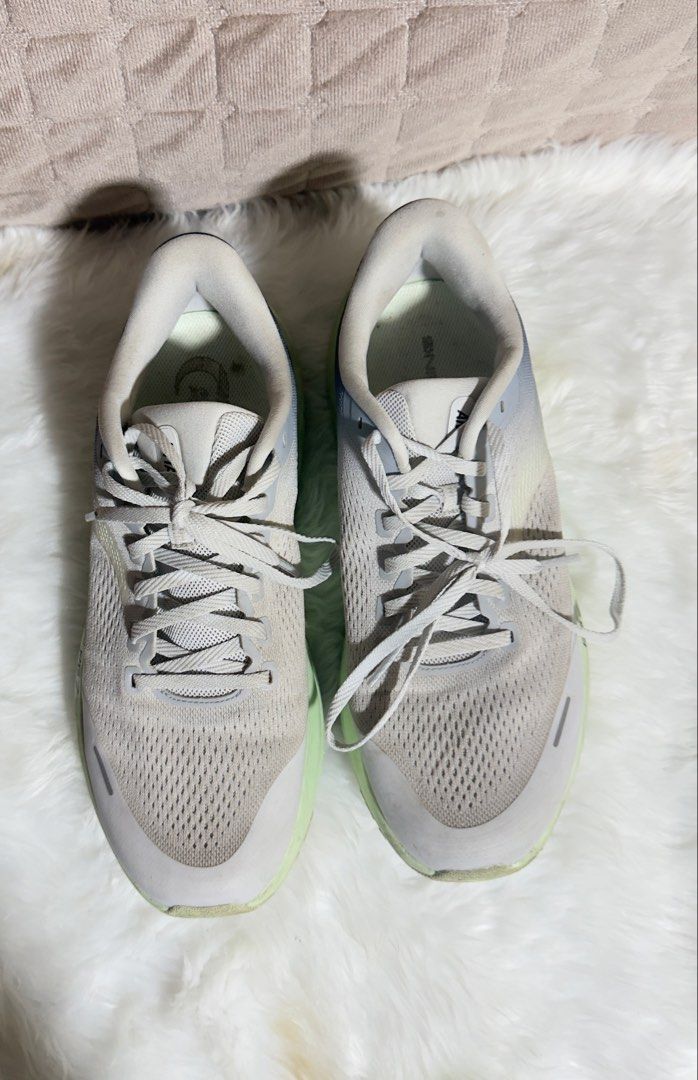 ANTA PG7 Travel 2 Running Shoes (Category: Sneakers) located in Las Pinas. Submitted by sugaaarr (Listing ID 1470265401, Image 3). Description: - Brand/Model: ANTA PG7 Running Shoes - Color: Light grey with unique greenish soles - Size: US 9.5 / UK 8.5 / EUR 43 / CHN 270 - Condition: Gently worn, minor scuffs on sole edges from normal use - Features: Breathable mesh upper, lace-up front, structured heel support, lightweight build - Best for: Comf