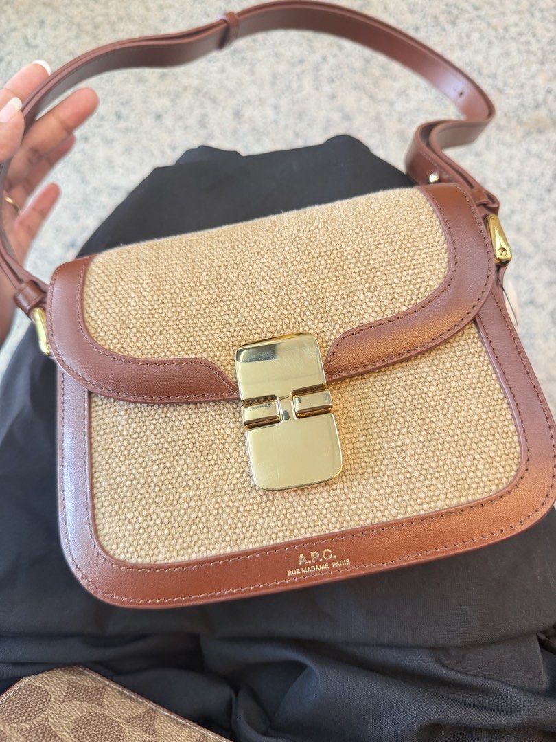 A.P.C. Brown Canvas Leather Flap Shoulder Bag (Category: Shoulder Bags) located in Caloocan City. Submitted by raminasanj77274 (Listing ID 1470246798, Image 1). Description: - Authentic A.P.C. shoulder bag crafted from premium brown leather and beige woven fabric - Elegant gold-tone hardware with a secure front flap clasp closure - Clean suede interior featuring multiple compartments and the iconic branded leather patch - Comfortable adjustable s