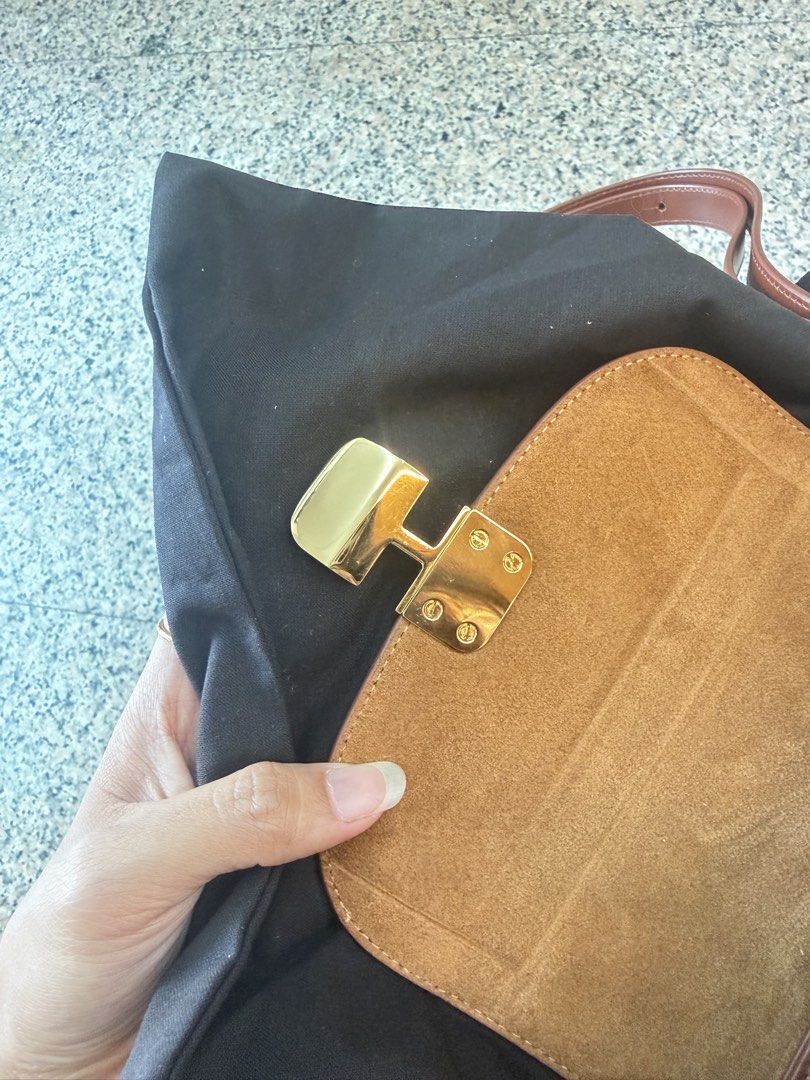 A.P.C. Brown Canvas Leather Flap Shoulder Bag (Category: Shoulder Bags) located in Caloocan City. Submitted by raminasanj77274 (Listing ID 1470246798, Image 3). Description: - Authentic A.P.C. shoulder bag crafted from premium brown leather and beige woven fabric - Elegant gold-tone hardware with a secure front flap clasp closure - Clean suede interior featuring multiple compartments and the iconic branded leather patch - Comfortable adjustable s