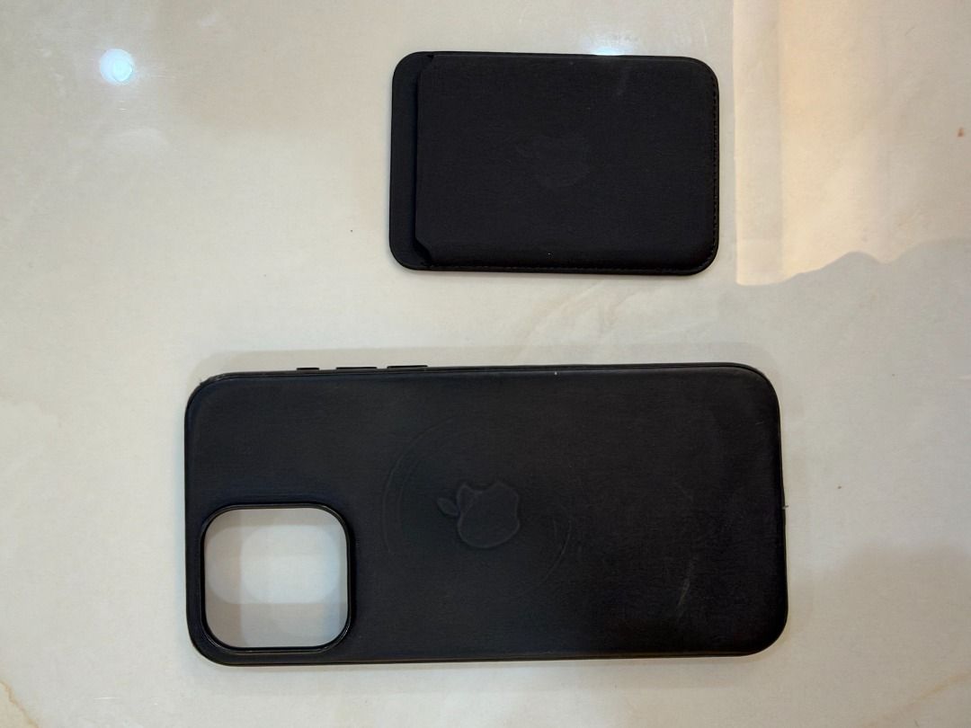 Apple iPhone Pro Max Leather Case MagSafe + Apple Leather Wallet (Authentic) (Category: Cases & Sleeves) located in Pasig City. Submitted by lhj0981olx (Listing ID 1470254186, Image 1). Description: For sale: Apple Leather Case with MagSafe for iPhone Pro Max + Apple Leather Wallet with MagSafe. 100% authentic Apple, black. Includes: - 1x Apple Leather Case with MagSafe (iPhone Pro Max) - 1x Apple Leather Wallet with MagSafe Condition: - Used, wi