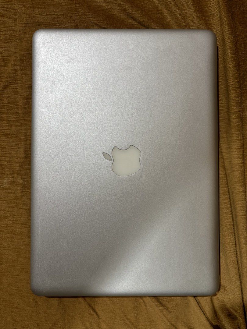 Apple MacBook Pro 13-inch Mid 2012 (Category: Laptops & Notebooks) located in Cavite. Submitted by axeliz (Listing ID 1470306098, Image 3). Description: - Model: Mid 2012 13-inch MacBook Pro (Silver Aluminum body) - OS: macOS Catalina (v10.15.8) - Processor: 2.5 GHz Dual-Core Intel Core i5 - Memory: 8 GB 1333 MHz DDR3 RAM - Graphics: Intel HD Graphics 4000 1536 MB - Keyboard: Backlit keyboard - Inclusions: Original charger included - Condition: G