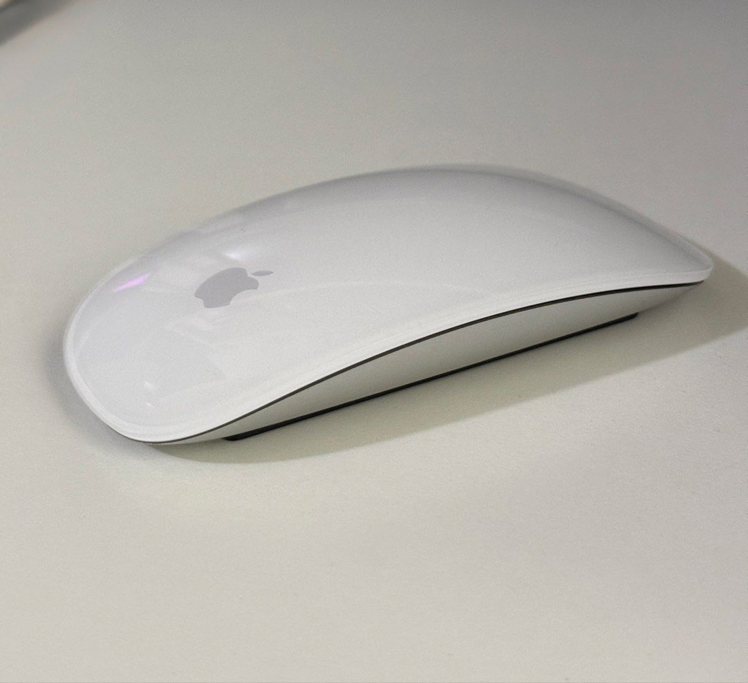 Apple Magic Mouse 2 Silver (Category: Mouse & Mousepads) located in Angeles City. Submitted by holyfabclothing (Listing ID 1470228037, Image 1). Description: - Authentic Apple Wireless Mouse (Model A1657) - Sleek silver aluminum bottom with classic white top - Smooth multi-touch surface supports intuitive gestures - Built-in rechargeable battery (charges via Lightning port) - Clean unit with light surface marks from normal use - 100% functional a
