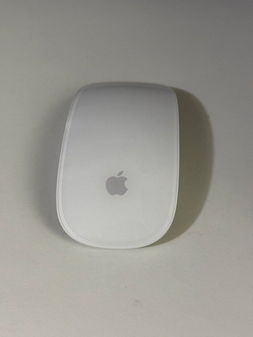 Apple Magic Mouse 2 Silver (Category: Mouse & Mousepads) located in Angeles City. Submitted by holyfabclothing (Listing ID 1470228037, Image 2). Description: - Authentic Apple Wireless Mouse (Model A1657) - Sleek silver aluminum bottom with classic white top - Smooth multi-touch surface supports intuitive gestures - Built-in rechargeable battery (charges via Lightning port) - Clean unit with light surface marks from normal use - 100% functional a
