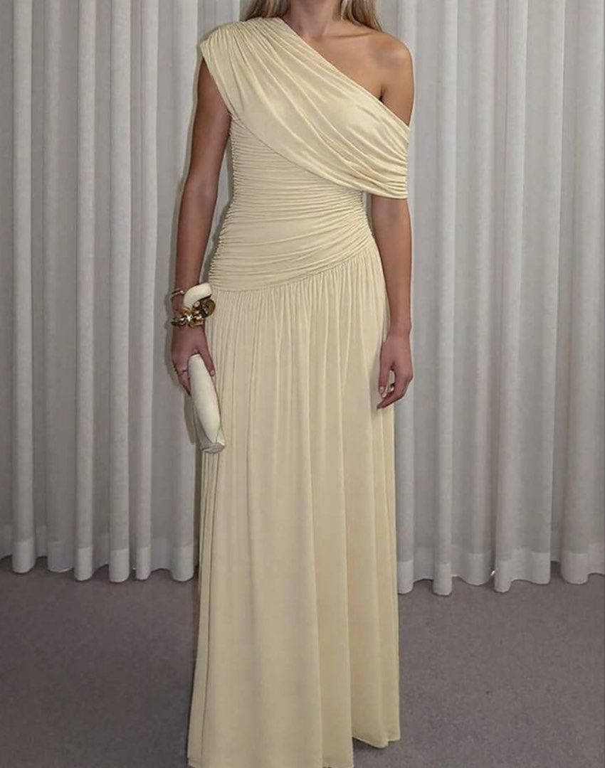 Apricot One-Shoulder Draped Maxi Dress (Category: Dresses) located in Cavite. Submitted by florabells (Listing ID 1470274824, Image 2). Description: - Color: Apricot - Material: Soft stretch fabric that hugs the body - Used only once.