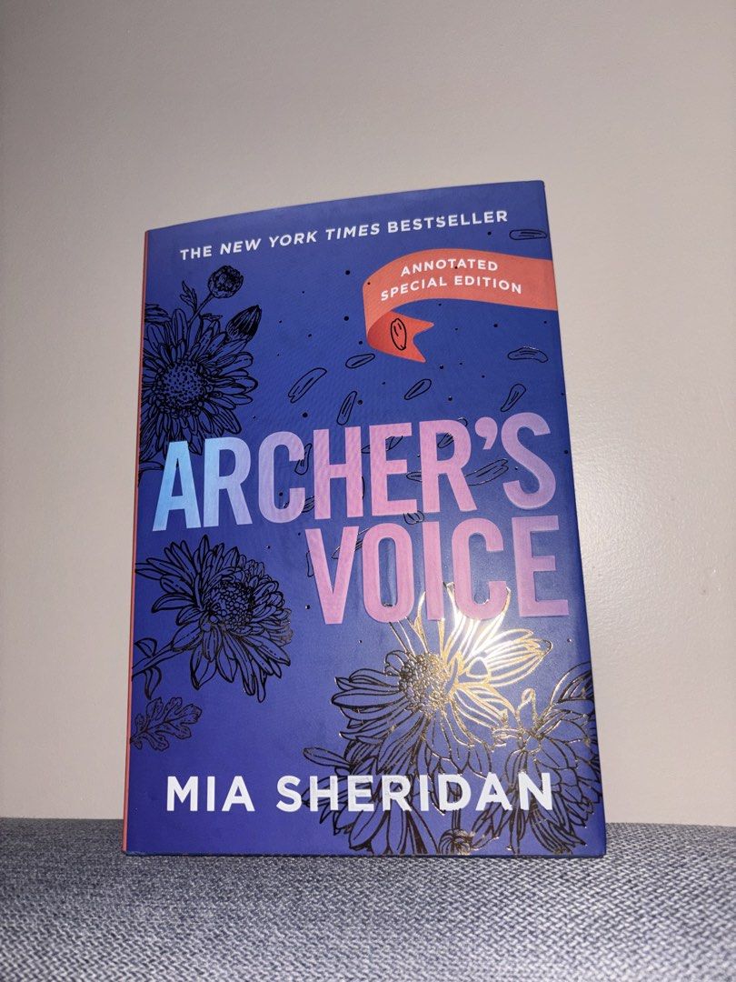 Archer's Voice Annotated Special Edition Mia Sheridan (Category: Storybooks) located in Manila. Submitted by danilyndane (Listing ID 1470291720, Image 1). Description: - Title: Archer's Voice by Mia Sheridan (Annotated Special Edition) - Status: New York Times Bestseller - Format: Paperback - Design: Stunning blue cover with floral illustrations and gold/pink foil details - Condition: Brand New - Mode of Payment: GCash, BPI, or COD available - Sh