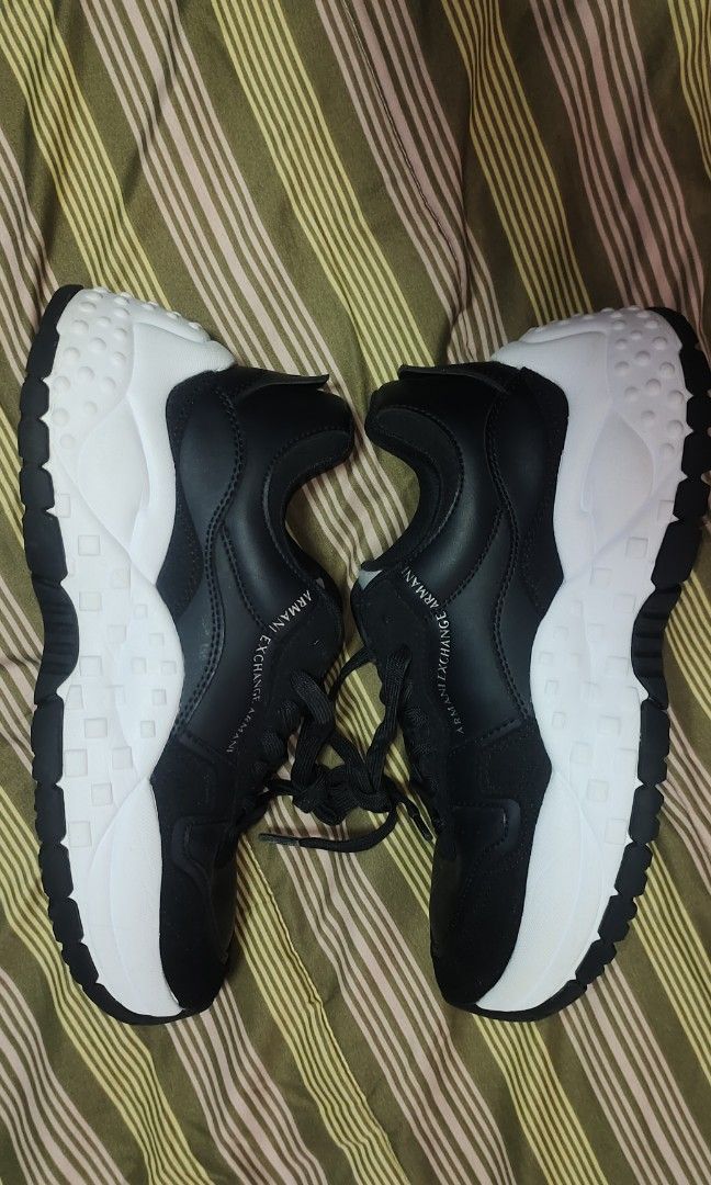 Armani Exchange Unisex Sneaker (Category: Sneakers) located in Manila. Submitted by myno23lenel (Listing ID 1470145076, Image 3). Description: For sale Armani Exchange AX sneaker unisex Size 8 women's 39 euro Like new no box,Authentic pair Only issue scratched on the midsole unnoticeable, For only 1.6k Location Fairview.