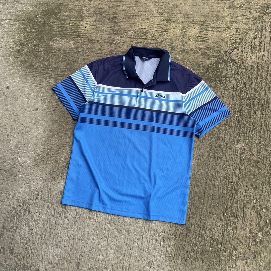 Asics Blue Striped Polo Shirt (Category: Tshirts & Polo Shirts ) located in Manila. Submitted by lawlaw21 (Listing ID 1470177930, Image 1). Description: - Brand: Asics - Color: Navy blue and bright blue with horizontal stripes - Size: 100 - Features: Polo collar, single button placket, lightweight athletic fabric - Perfect for active wear or smart-casual looks.