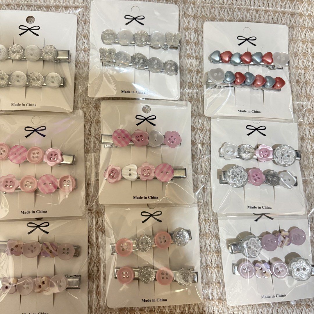 Assorted Cute Fabric and Button Hair Clips Set (Category: Hair Accessories) located in Manila. Submitted by asteria.ann (Listing ID 1470248582, Image 2). Description: Cute Hair Pin .