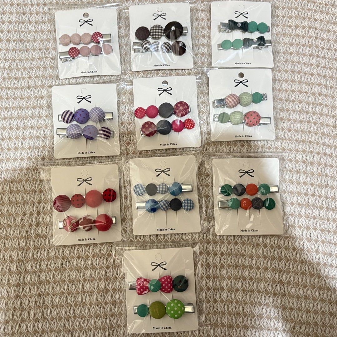 Assorted Cute Fabric and Button Hair Clips Set (Category: Hair Accessories) located in Manila. Submitted by asteria.ann (Listing ID 1470248582, Image 3). Description: Cute Hair Pin .