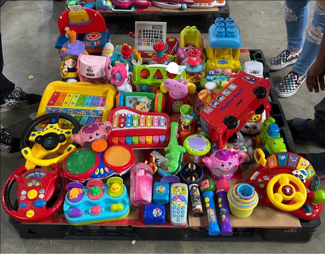 Assorted Musical Toys and Educational Playthings Bundle (Category: Kids Toys) located in Manila. Submitted by starbalesukandjapansurplus (Listing ID 1470347843, Image 1). Description: - Massive toddler toy bundle sold as a whole set - Includes musical keyboards, xylophones, and toy microphones - Features steering wheel toys, shape sorters, and stacking cups - Comes with colorful vehicles, including a red playtime bus - Packed with sound-making bu