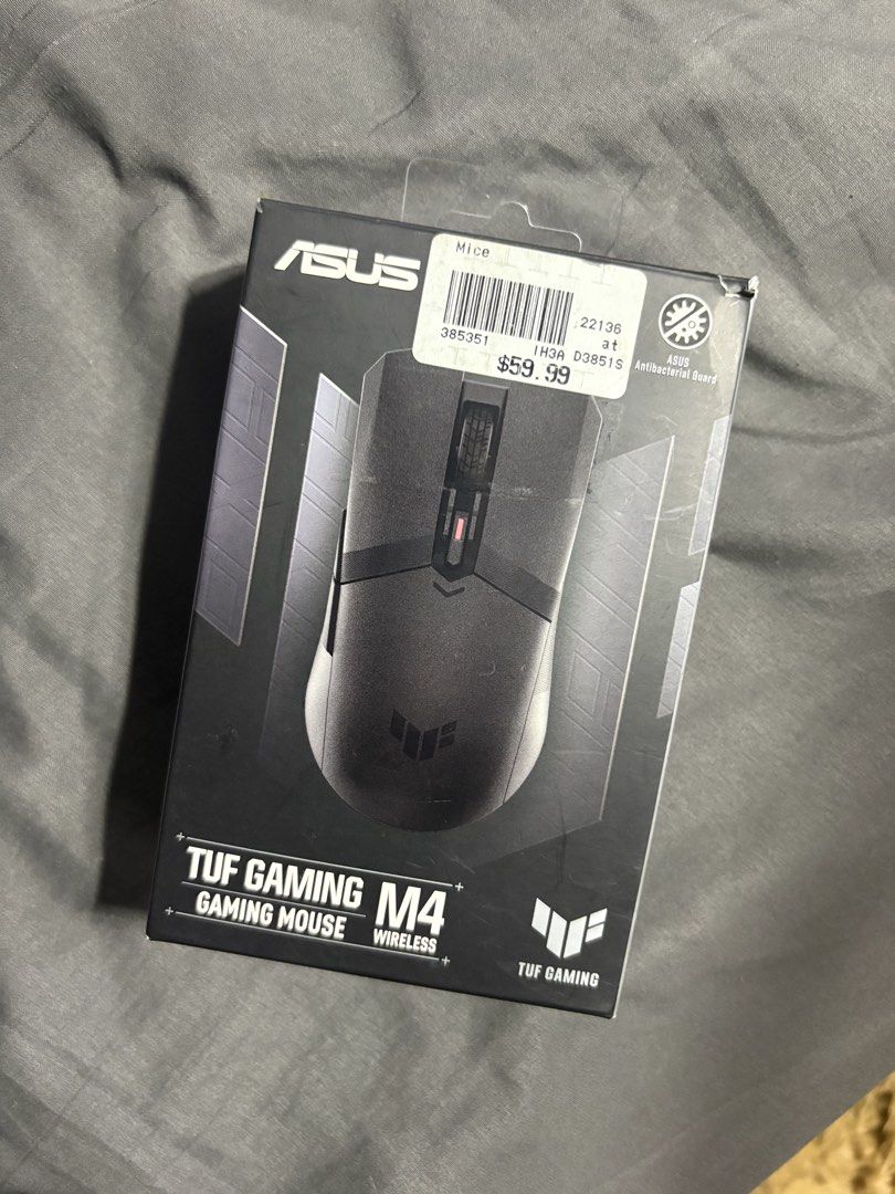 ASUS TUF Gaming M4 Wireless Mouse (Category: Mouse & Mousepads) located in Manila. Submitted by mortiv (Listing ID 1470181060, Image 1). Description: - Model: ASUS TUF Gaming M4 Wireless Optical Mouse - Connectivity: Dual wireless modes for versatile use - Build: Durable PBT top cover featuring an antibacterial guard - Design: Comfortable symmetrical ambidextrous grip - Inclusions: Original box, quick start guide, and batteries included - Conditi