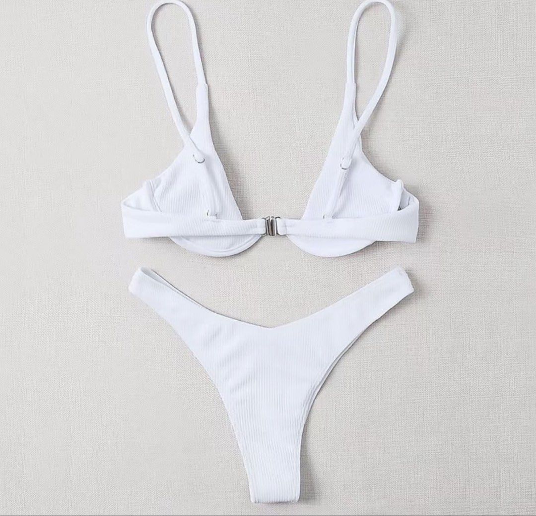 ASVANA Ribbed White Bikini Set Size M (Category: Bikinis & Swimsuits) located in Rizal. Submitted by kianapreloves (Listing ID 1470258841, Image 2). Description: - Brand: Asvana - Color: White - Style: Two-piece ribbed bikini set - Top: Underwire with adjustable straps and metal hardware - Bottoms: Matching textured fabric with Size M tag attached - Condition: Brand new, never worn.