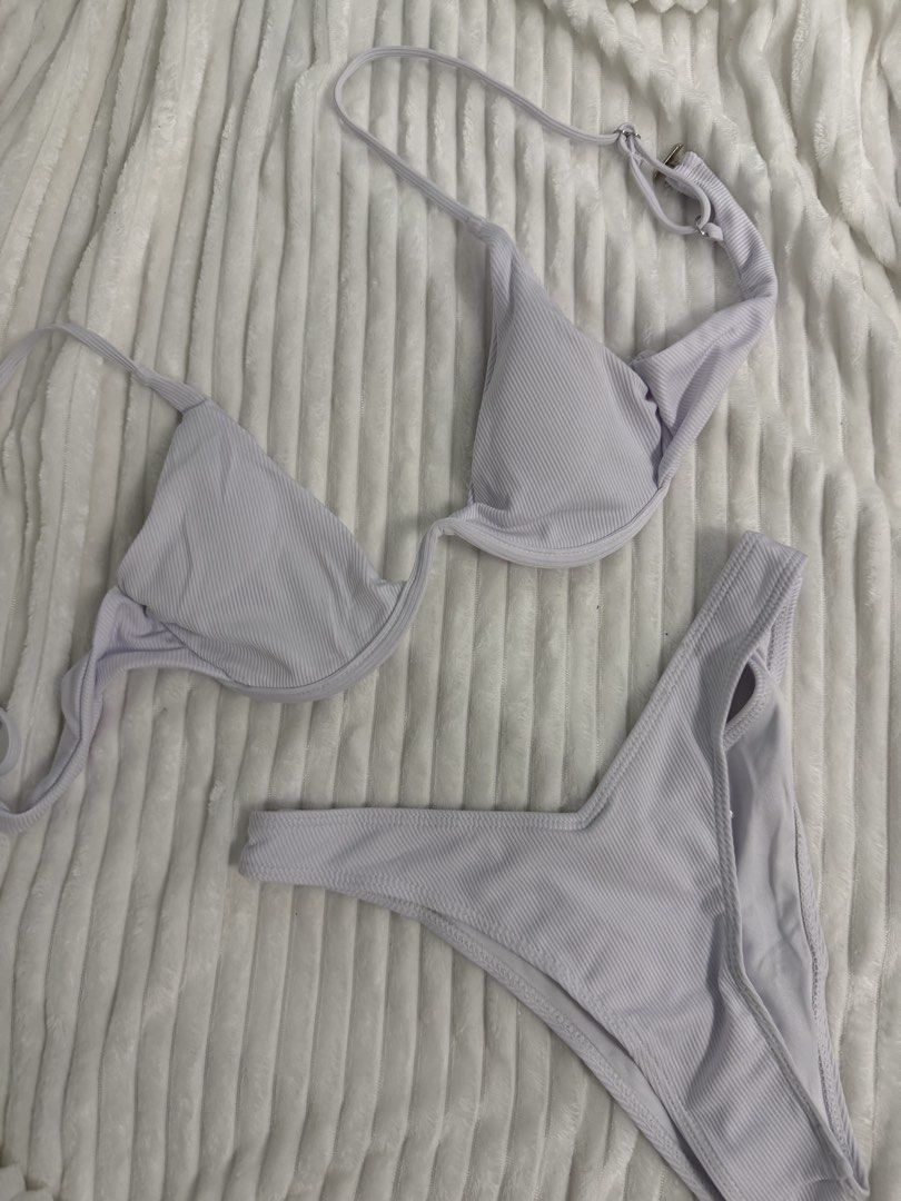 ASVANA Ribbed White Bikini Set Size M (Category: Bikinis & Swimsuits) located in Rizal. Submitted by kianapreloves (Listing ID 1470258841, Image 3). Description: - Brand: Asvana - Color: White - Style: Two-piece ribbed bikini set - Top: Underwire with adjustable straps and metal hardware - Bottoms: Matching textured fabric with Size M tag attached - Condition: Brand new, never worn.