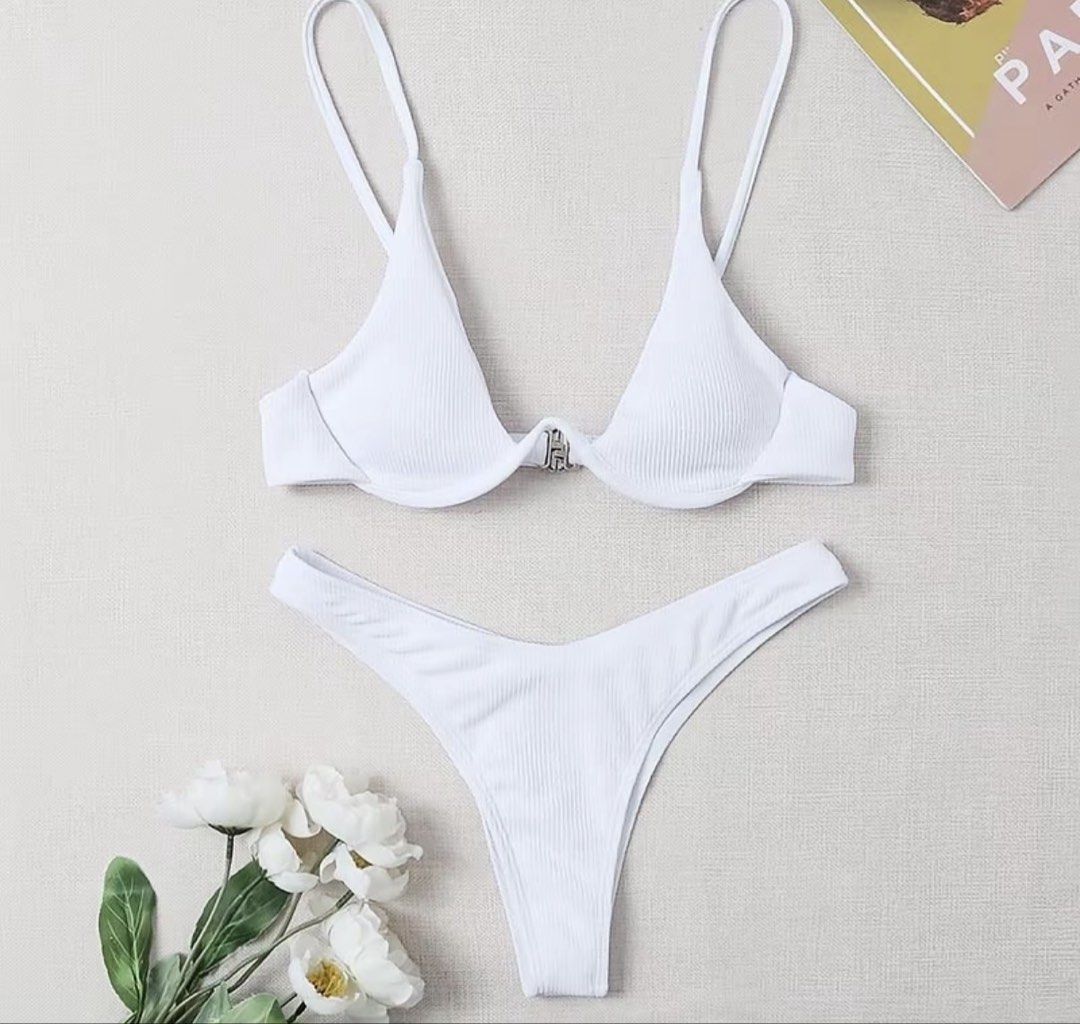 ASVANA Ribbed White Bikini Set Size M (Category: Bikinis & Swimsuits) located in Rizal. Submitted by kianapreloves (Listing ID 1470258841, Image 1). Description: - Brand: Asvana - Color: White - Style: Two-piece ribbed bikini set - Top: Underwire with adjustable straps and metal hardware - Bottoms: Matching textured fabric with Size M tag attached - Condition: Brand new, never worn.
