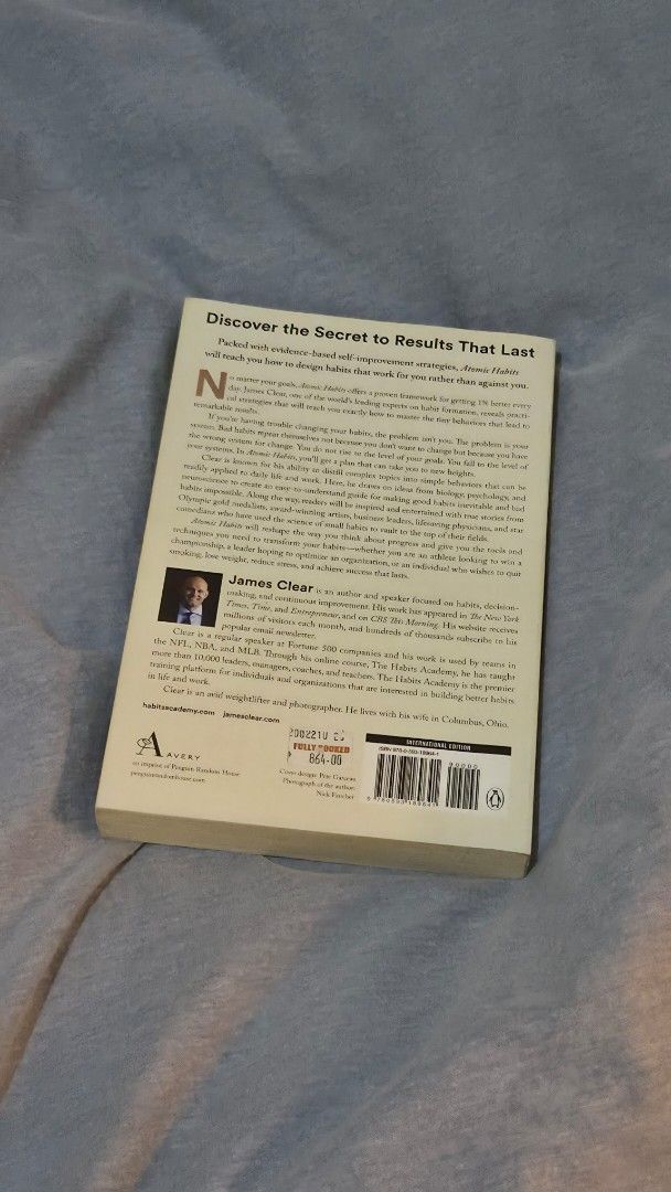 Atomic Habits by James Clear (Category: Storybooks) located in Muntinlupa City. Submitted by pearlbookstore (Listing ID 1470302935, Image 2). Description: - Title: Atomic Habits by James Clear - Format: Paperback edition with clear, readable text - Condition: Read once, very clean and tidy - Highlights: Bestselling guide on building good habits, breaking bad ones, and making tiny changes for remarkable results - Size: Standard size, easy to fit i
