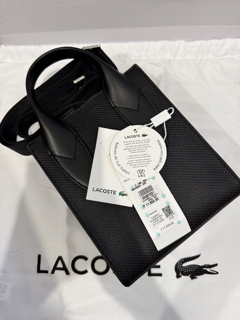 AUTHENTIC Lacoste Noir Mini Chantaco (Category: Sling Bags) located in Manila. Submitted by coco.junk (Listing ID 1470272084, Image 3). Description: FS: Authentic Lacoste Mini Chantaco Bag (Noir) Used ONLY ONCE - in pristine condition, good as brand new! • Color: Noir / Black • Bought for: P11,650 • Selling Price: P8,999 • RFS: Decluttering Product details • Chantaco embossed leather exterior • Adjustable strap: 85cm-140cm • 2 flat mesh compartme