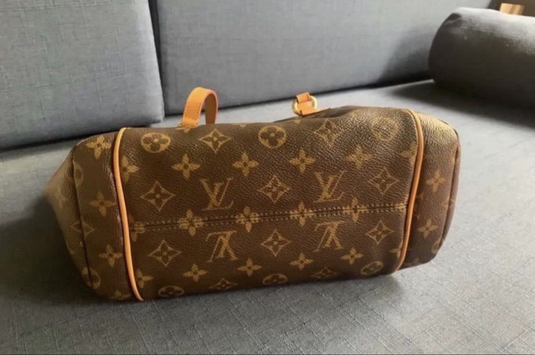 AUTHENTIC Louis Vuitton Monogram Canvas Tote Bag (Category: Luxury Bags & Wallets) located in Paranaque City. Submitted by pretty_in_peach_ph (Listing ID 1470171128, Image 3). Description: - Authentic Louis Vuitton tote in classic monogram canvas - Vachetta leather shoulder straps and piping details - Secure top zip closure with gold-tone hardware - Convenient side exterior slip pockets on both sides - Clean dark interior lining with structured b