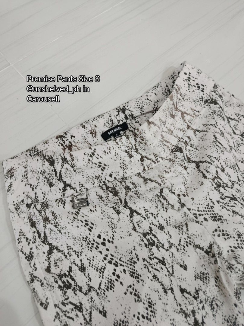 (AUTHENTIC) Premise Snakeskin Print Pants Size S (Category: Jeans) located in Trece Martires City. Submitted by unshelved_ph (Listing ID 1470209363, Image 1). Description: - Brand: Premise - Size: S - Pattern: Monochrome snake print - Design: Stretchable waistband with small metal hardware near the front pocket - Details: Clean interior branding tag - Styling: Perfect to pair with basic black or white tops - DM for more pics/vids if needed - CO t