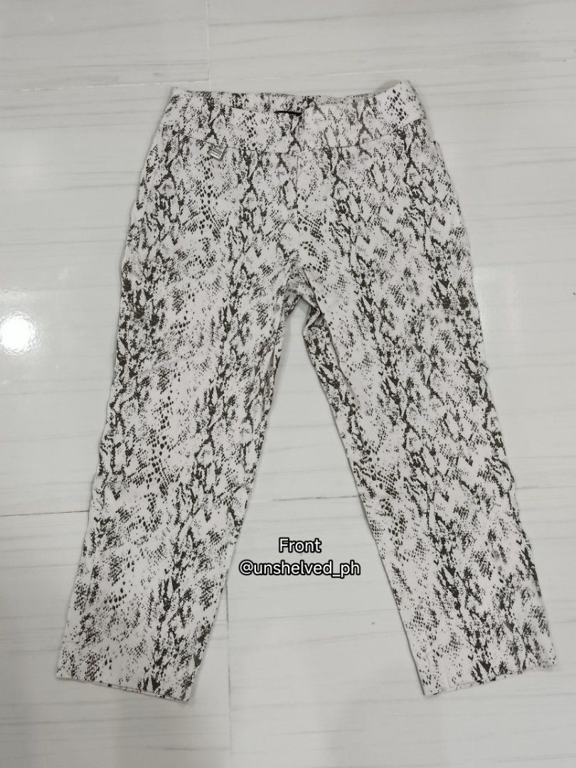 (AUTHENTIC) Premise Snakeskin Print Pants Size S (Category: Jeans) located in Trece Martires City. Submitted by unshelved_ph (Listing ID 1470209363, Image 2). Description: - Brand: Premise - Size: S - Pattern: Monochrome snake print - Design: Stretchable waistband with small metal hardware near the front pocket - Details: Clean interior branding tag - Styling: Perfect to pair with basic black or white tops - DM for more pics/vids if needed - CO t