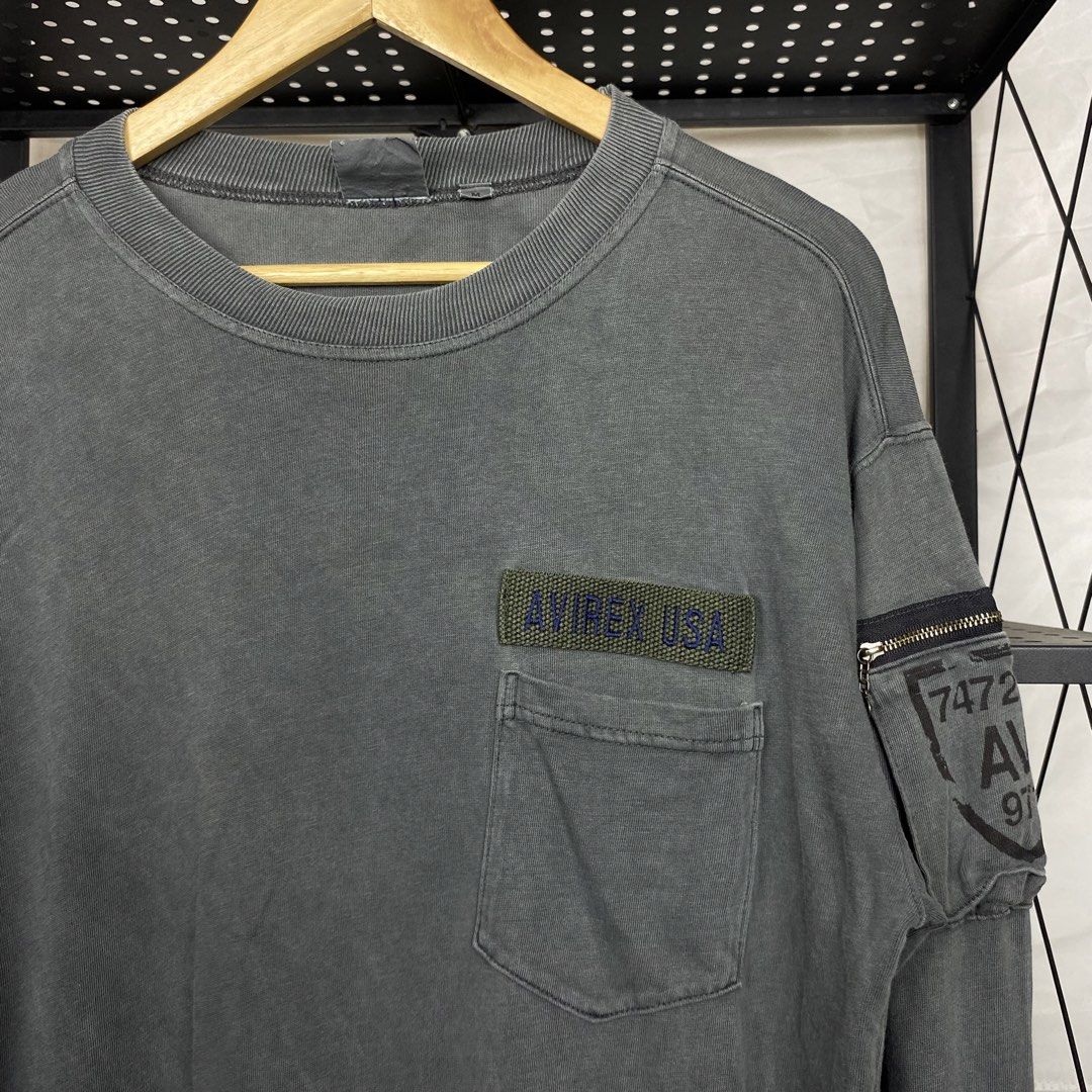 Avirex Military Longsleeves (Category: Coats, Jackets and Outerwear) located in Cebu City. Submitted by cebuvntgvibes (Listing ID 1470216235, Image 2). Description: 21W x 29L (M-XL) . Excellent to new condition. Nice charcoal-wash colorway. Utility pockets on both sleeves. Military-style stencil prints. No issue. . Mine ₱1,200+sf.