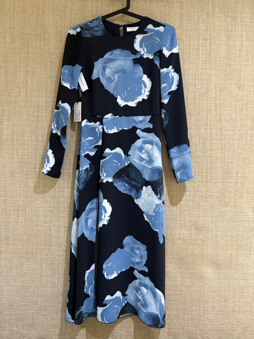 Babaton Blue Floral Long Sleeve (Category: Dresses) located in Muntinlupa City. Submitted by jane226ph (Listing ID 1470084405, Image 1). Description: Original Babaton by Aritzia Brand new Bought in Canada Round neckline, back button closure with keyhole cutout, hidden back waist zipper, and skirt side slit .