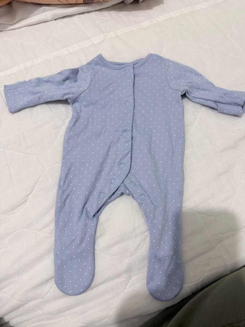 Baby Footed Sleepsuit (Category: Babies & Kids Fashion) located in Muntinlupa City. Submitted by maaarjj (Listing ID 1470292936, Image 2). Description: - Set of 3 cozy footed baby sleepsuits - Designs: Mint green floral, light blue polka dots, and purple/green floral - 100% soft cotton material gentle on newborn skin - Convenient snap buttons down the front and legs for quick diaper changes - Long sleeves with built-in foot covers to keep tiny fe