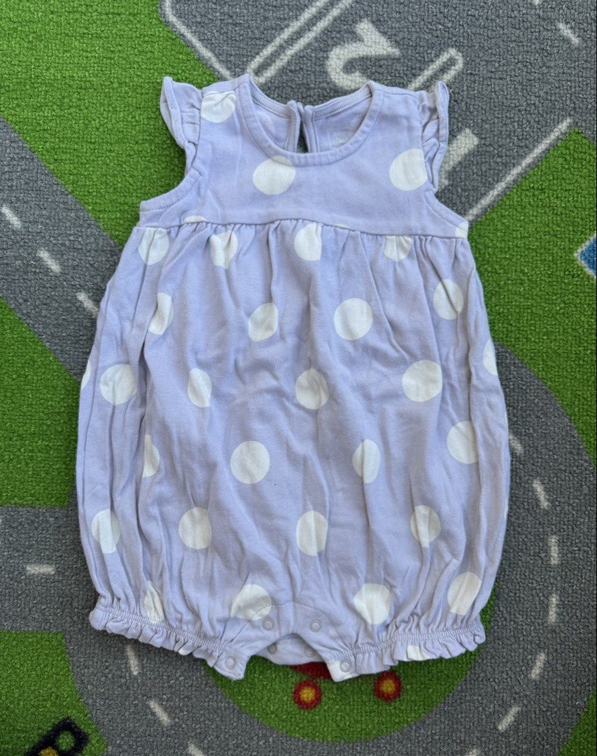 Baby Gap Polka Dot Bubble Romper Onesie (Category: Babies & Kids Fashion) located in Rizal. Submitted by preloovved (Listing ID 1470207983, Image 1). Description: Super cute light grey baby bubble romper with white polka dots, ruffled shoulders, and soft cotton fabric. Features back buttons and bottom snaps for easy diaper changes. Preloved, 3-6mos Meet-up only in GB1 San Mateo, Rizal Shipping fee c/o buyer. Tres Marias or J&T express Payment to 