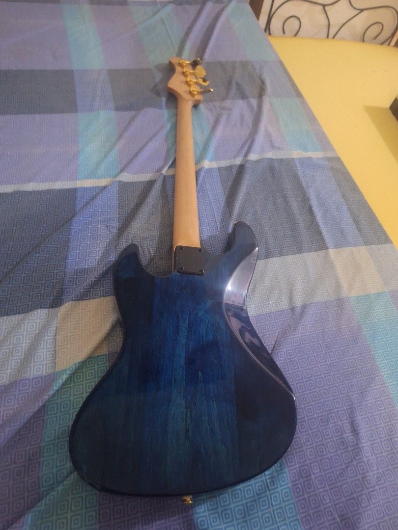 Custom Built 4-String Jazz Bass (Blue Quilt Mapl (Category: Musical Instruments) located in Caloocan City. Submitted by zentree.a7f167 (Listing ID 1470277705, Image 3). Description: Custom Built 4-String Jazz Bass (Blue Quilt Maple / Tonerider PU) - Negotiable Letgo-ing an absolute looker and a tone monster! This is a custom-built Jazz Bass that has only been played at home—almost brand new, pristine condition, and never stepped foot on a live gi