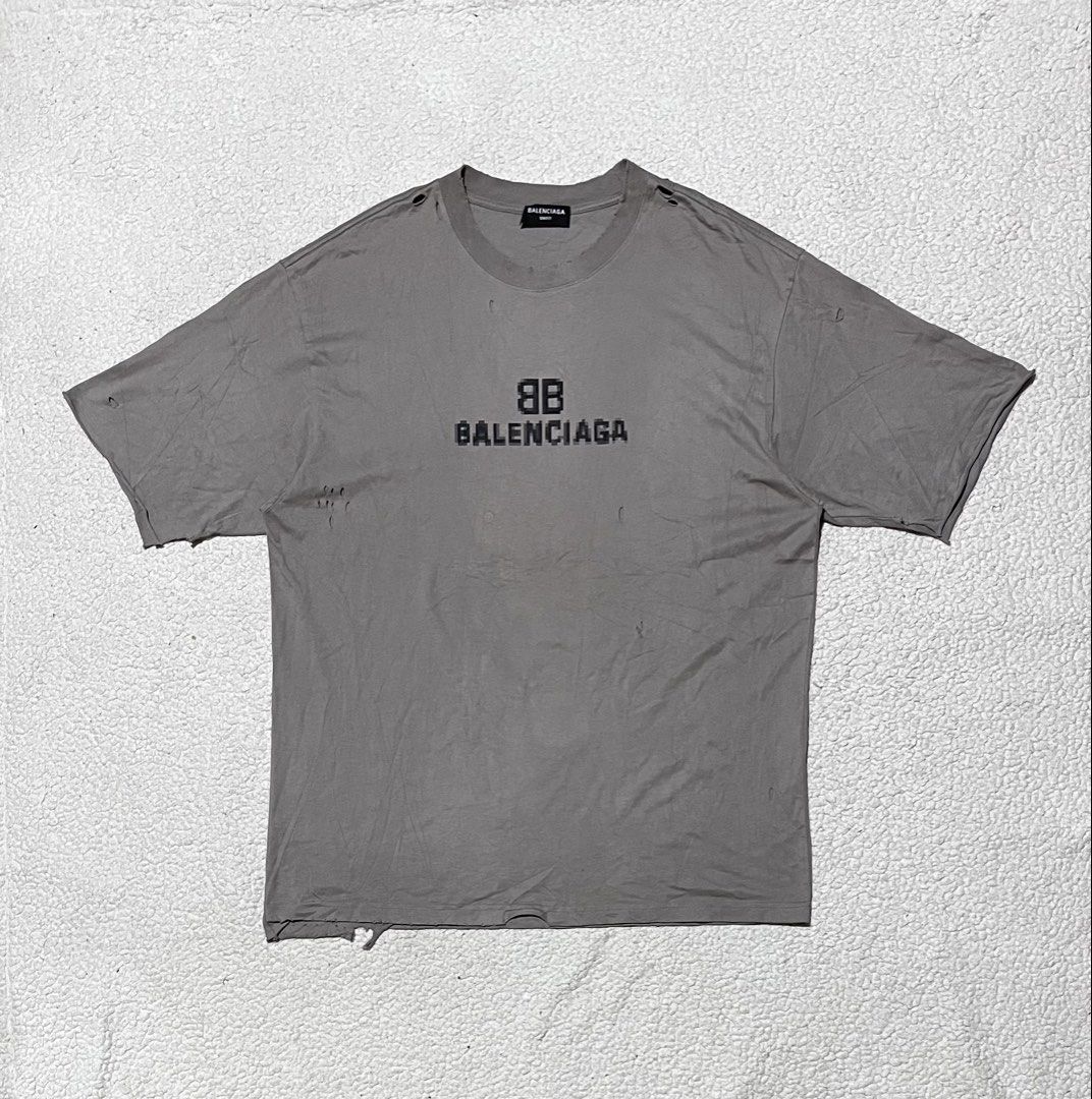 Balenciaga BB Pixel Boxy Distressed T-Shirt (Category: Tshirts & Polo Shirts ) located in Dipolog. Submitted by knightorious_thrift (Listing ID 1470253166, Image 2). Description: Size Large Width: 24 Length: 32 9.8/10 color rate Excellent condition No flaws Location Mindanao Gcash / J&T Express.