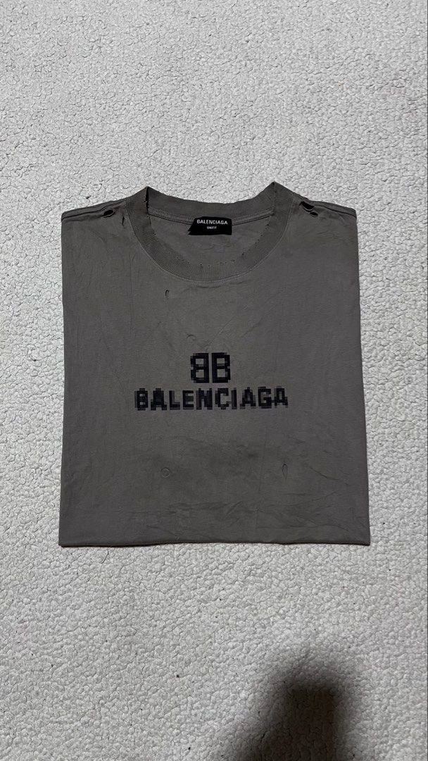 Balenciaga BB Pixel Boxy Distressed T-Shirt (Category: Tshirts & Polo Shirts ) located in Dipolog. Submitted by knightorious_thrift (Listing ID 1470253166, Image 1). Description: Size Large Width: 24 Length: 32 9.8/10 color rate Excellent condition No flaws Location Mindanao Gcash / J&T Express.