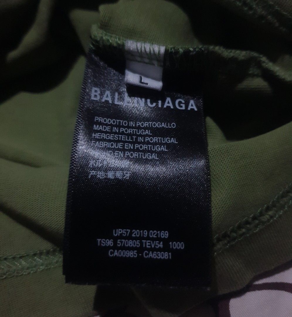 Balenciaga croptop olive green (Category: Shirts) located in San Fernando. Submitted by retro.district. (Listing ID 1470345368, Image 3). Description: - Balenciaga croptop olive green - Size: Large(21x20) - Condition: Excellent - No issue - Color Rate: 9.5/10.