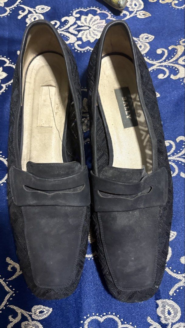 Bally Black Patterned Loafers (Category: Loafers) located in Makati City. Submitted by badbihswaggage (Listing ID 1470301985, Image 1). Description: - Brand: Bally - Style: Slip-on penny loafers with low block heel - Material: Textured diamond pattern upper with smooth leather trim - Color: Black with beige inner sole - Condition: Pre-owned with visible wear on insoles and soles - Features: Bally logo stamp on the right insole, everyday comfort d