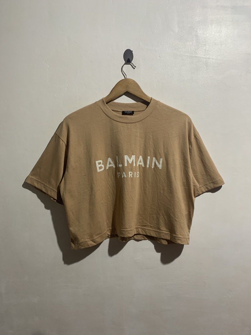 BALMAIN CROPPED TEE (Category: Others Tops) located in Gumaca. Submitted by getscore.ph (Listing ID 1470284723, Image 1). Description: WTS ❗️BALMAIN CROPPED TEE❗️ Sariwa✨ ✅Size: L on tag ✅Dimes: Width 22 Length 18.5 ✅Color Rate: 9.7/10 ✅Condition: Excellent ✅Issue: None Color may due to lightning NEED WASH FRESH FROM BALE DM ME TO PURCHASE 📥 📍Loc. Gumaca,Quezon 📍Courier: JNT EXPRESS.
