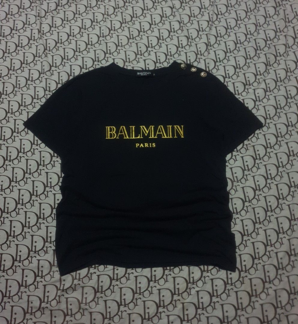 Balmain Paris tshirt (Category: Shirts) located in San Fernando. Submitted by retro.district. (Listing ID 1470346441, Image 1). Description: - Balmain Paris tshirt - Size: Medium(19x28) - Condition: Excellent - No issue - Color Rate: 9.5/10.