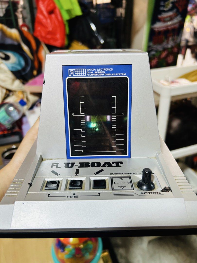 Bandai Electronics FL U-Boat Dual Screen Fluorescent Display System (Category: Nintendo) located in Manila. Submitted by starbalesukandjapansurplus (Listing ID 1470347714, Image 3). Description: Batt OP/ Pwede de Charge (no charger included) - Rare vintage 1980s Bandai FL U-Boat handheld game - Classic submarine combat gameplay with dual-screen fluorescent display - Authentic silver housing featuring control switches, action knob, and fire button