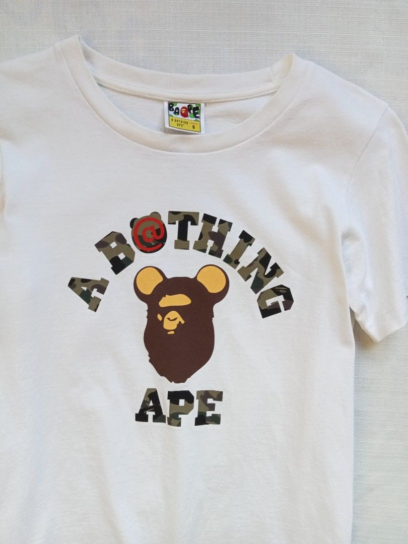 BAPE bearbrick collage tee for her (Category: Shirts) located in Bagabag. Submitted by thrift_stories96 (Listing ID 1470251854, Image 2). Description: BAPE bearbrick collage tee for her Small on tag fits medium Length - 25.5 Width - 18 Condition - excellent No flaw.