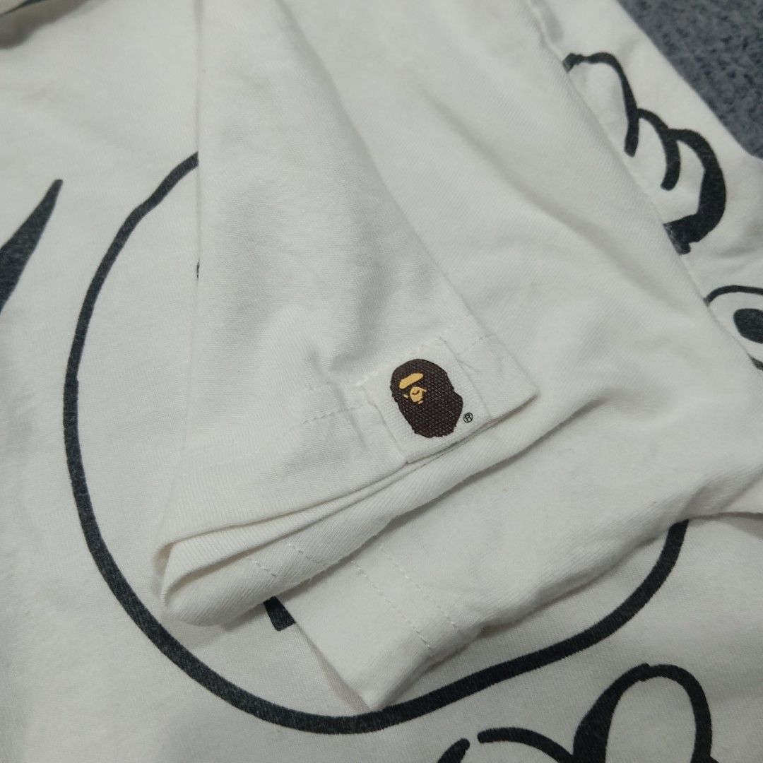 BAPE Kids Graffiti Pattern Tee (Category: Babies & Kids Fashion) located in Taguig. Submitted by sito. (Listing ID 1470327114, Image 2). Description: For sale! 📣 BAPE Kids Graffiti Pattern Tee Specs and measurements: • Length 23 inches • Width 18 inches Condition Details: • Excellent Condition • No issue • Color rate: 10/10 • Overall Condition: 10/10 Price: ~ ₱556 Transaction Details: Location: Upper Bicutan, Taguig City, Metro Manila, 1633 Paym