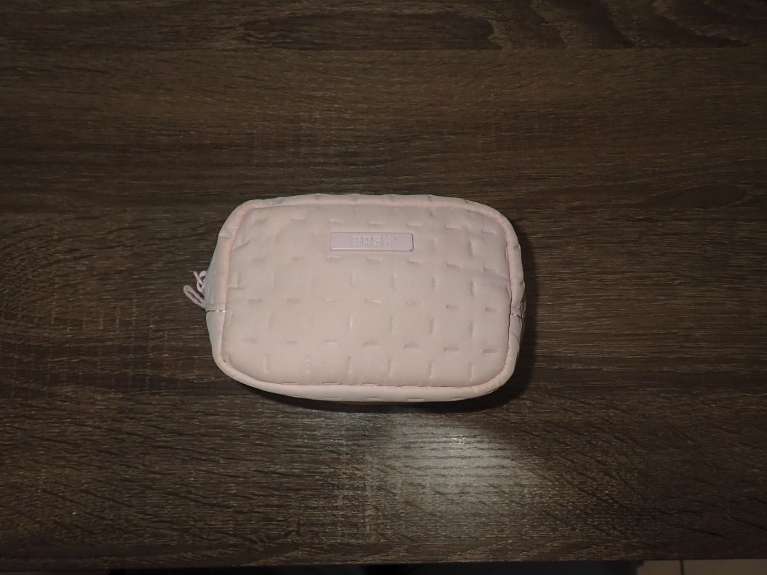 BASH Billow Mini Purse in Blush (Category: Purses & Pouches) located in Pasig City. Submitted by shanemendozaa (Listing ID 1470344522, Image 3). Description: Bought for 295 RFS: decluttering Billow Purse / BASH-016 13cm (L) × 6.5cm9W) × 9cm(H) - Solid tone color with embossed design and matte finish logo - Full zip main compartment closure - Matte finish hardware - Semi-structured construction - With two mesh slide pockets - Comes with BASH smoke