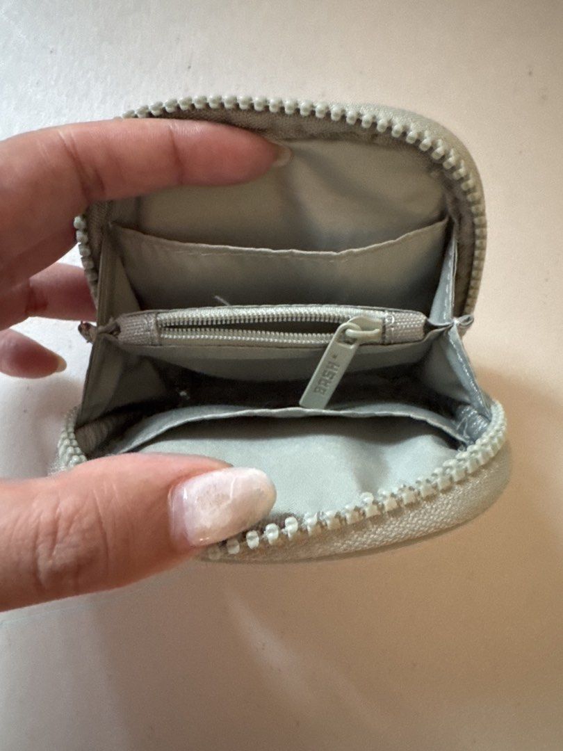 Bash Essentials Card Holder (Category: Wallets & Card holders) located in Los Banos. Submitted by declutterbycee (Listing ID 1470345489, Image 2). Description: With minor flaw: some stains at the logo at the back but the wallet is in overall good condition.
