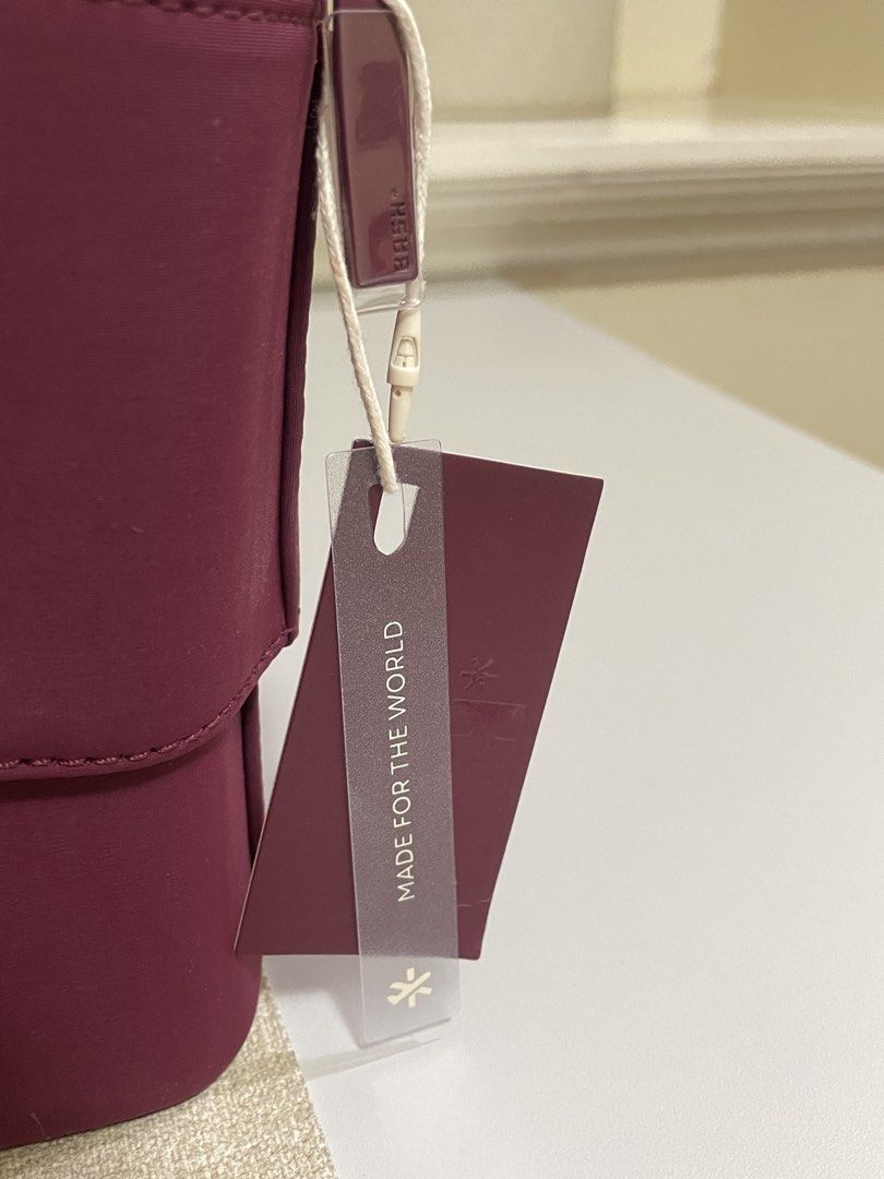 BASH x BLK Expendition Flex Organizer in Burgundy (Category: Purses & Pouches) located in Calamba. Submitted by melibear (Listing ID 1470312486, Image 3). Description: - Brand new with store tags attached - Rich burgundy color with monogram fabric lining - Structured design featuring a convenient top carry handle - Secure double zip-around closure - Spacious interior with lid mesh zippered pockets and back wall mesh pouches - Deep storage capacit