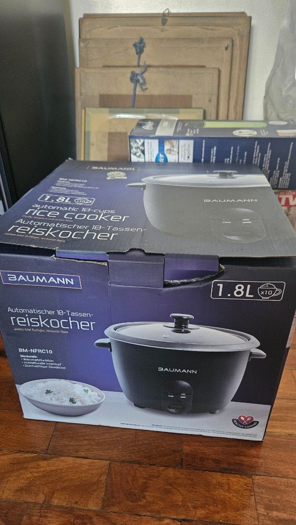 Baumann 1.8L Automatic Rice Cooker BM-NFRC10 (Category: Cookers) located in Manila. Submitted by lenzp (Listing ID 1470171603, Image 1). Description: - FREE SHIPPING within manila, QC nearby only - Brand: Baumann - Model: BM-NFRC10 - Capacity: 1.8L (cooks up to 10 cups of rice) - Color: Sleek black outer body - Includes: Clear glass lid and matching inner pot - Condition: Brand new, still securely packed in original box packaging - Ideal for: Coo