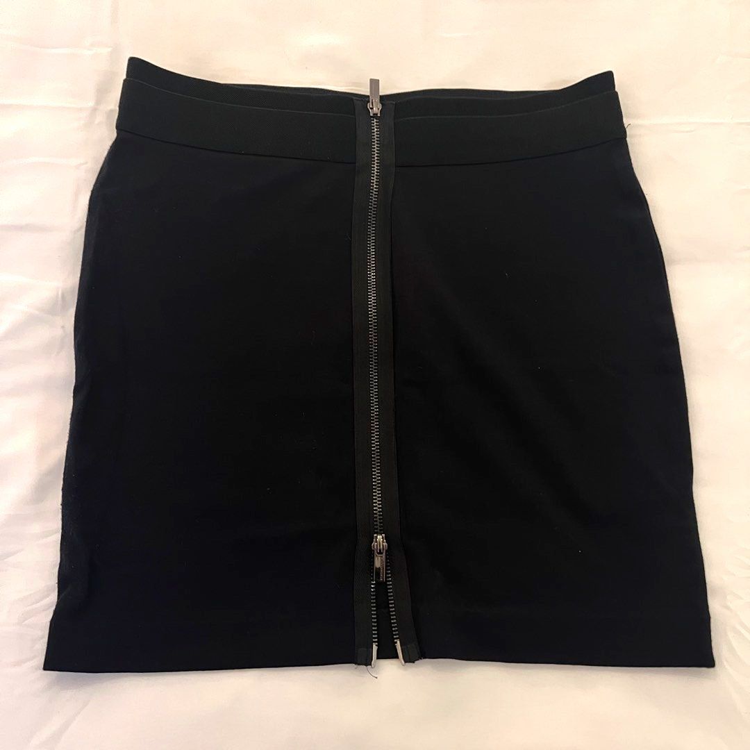 BCBGMAXAZRIA Black Zipper Skirt Size S (Category: Skirts) located in Binan City. Submitted by lovedbynins (Listing ID 1470222096, Image 2). Description: Brand: BCBGMAXAZRIA Black skirt size Small. Two-way metal back zipper that goes all the way down Waistband: Thick elastic for a secure and comfortable fit. Condition: zippers work smoothly; has some minor linting on the fabric. Kindly check and zoom photos for details 😊.