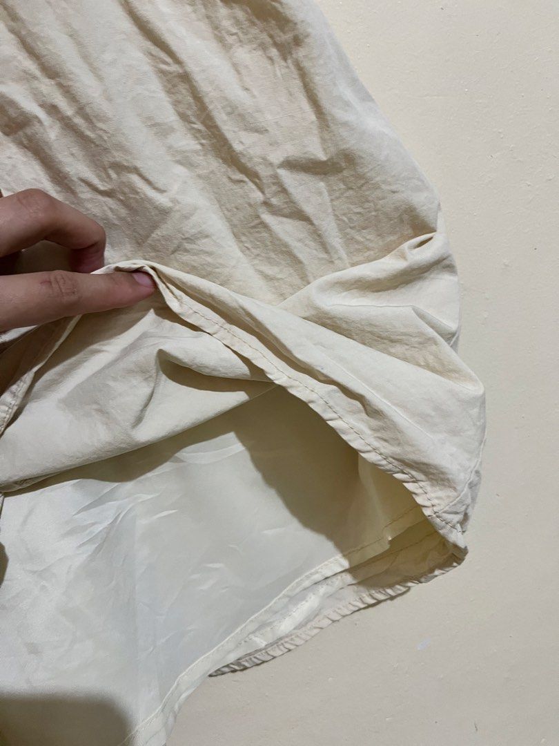 Beige Button-Front Shirt Dress with Pockets (Category: Dresses) located in Manila. Submitted by lovedbynixe (Listing ID 1470270665, Image 3). Description: Beige Button-Front Shirt Dress Small-med ₱180 Color: Versatile light beige neutral - Style: Utility-style shirt dress with a flared skirt and inner lining - Details: Collared neckline, front button closure to the waist, and two chest pockets - Fit: Cinched waistline with a knee-length cut (vari