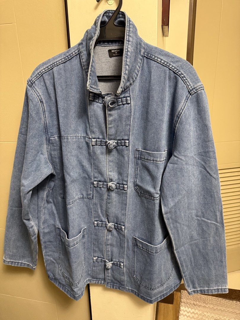 Bench Chongsan His & Hers Denim Jackets Size M & L (Category: Coats, Jackets and Outerwear) located in Pasig City. Submitted by davedeleon (Listing ID 1470309442, Image 3). Description: His & Hers Denim Jacket sold per piece - Brand: Bench - Size: Large and Medium - Color: Light wash blue - Fit: Relaxed fit style - Closure: Traditional Chinese knot frog buttons - Collar: Mandarin collar - Pockets: Multiple utility pockets on chest and lower front